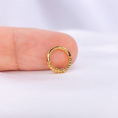 DETAILS ▪ Material: 14k Gold plated over brass ▪ Designed for: Septum, Daith, Rook, Cartilage ▪ Inner diameter: 8mm ▪ Thickness: 16g ▪ Closure: Seamless ring hoop ▪ Handcrafted in Spain SHIPPING & RETURNS SHIPPING POLICY ▪ All orders will be shipped out next day after the order has been received. Tracking Number included! Estimated shipping dates: ▪ USA and Canada: 5-16 business days with DHL ▪ Europe: 3-8 business days with DHL ▪ Spain: 2-4 business days from 4.28$ with Correos España ▪ Rest of Internally Threaded Yellow Gold Hoop Nose Rings, Gold Brass Cartilage Earrings, Adjustable Small Hoop Gold Septum Ring, Adjustable Gold Small Hoop Septum Ring, Gold Hoop Metal Piercings, Adjustable Gold Hoop Septum Ring, Handmade Gold Hoop Septum Ring, Gold Hoop Piercings For Gifts, Gold Internally Threaded Septum Ring