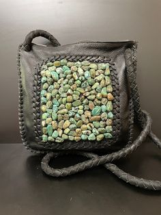 Biker Babe, Turquoise Cluster Crossover Bag.  Chic Bohemian Fashion Statements, Chunky, Bold, and Southeastern,  Art to Wear.  Length: 9 1/2" Width: 9 1/2" Strap Length: 23" With Back Pockets. Brass Zip Top Closure Artist: John Binzley Open studio most days from 10:00 to 5:00 make an appointment to have an adventure in shopping. Yes ~ along with basic simplicity, It's all about you You deserve to know about my fabulous Treasure chest. Tribal Jewelry, Statement Piece Handmade Jewelry, Art to Wear Bohemian Turquoise Crossbody Bag, Handmade Turquoise Shoulder Bag, Artisan Turquoise Shoulder Bag For Everyday, Bohemian Turquoise Rectangular Shoulder Bag, Handmade Turquoise Shoulder Bag For Travel, Handmade Turquoise Shoulder Bag For Everyday, Handmade Turquoise Rectangular Shoulder Bag, Crossover Bag, Biker Babe