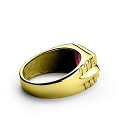 Metal: 14K Yellow GoldGemstone: RubyCarat Total Weight: 3.40Dimensions: 0.8CM x 1.0CMSetting Type: Bezel SettingSecondary Stone:DiamondsCarat Total Weight: 0.02Color: HClarity: VS1Setting Type: Pave Setting See More Categories Ruby Gold Rings 14K Gold Rings Ruby Rings Yellow Gold Rings Gold Rings Uniquely stunning, this gemstone ring showcases an exquisite 3.40 carat ruby and two brilliant diamonds framed in 14k yellow gold.----------------------------------------------------------------------Ru Modern Yellow Gold Ruby Ring For Formal Events, Modern Yellow Gold Ruby Ring For Formal Occasions, Modern Gold Ruby Ring, Modern Ruby Ring With Polished Finish In 14k Gold, Modern 14k Gold Ruby Ring With Polished Finish, Modern Gold Ruby Ring With Polished Finish, Modern Gold Ruby Ring For Anniversary, Modern Gold Emerald Ring With Center Stone, Yellow Gold Gemstone Signet Ring For Anniversary