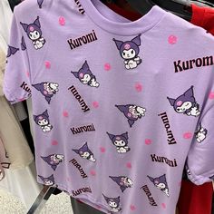 purple t - shirt with kittens on it and name written across the chest in japanese