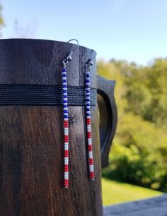 These patriotic earrings are perfect for an American holiday with its appropriate beading of red, white and blue. Patriotic Earrings, Beaded Jewelry Earrings, Patriotic Jewelry, American Holiday, Jeans Bags, Blue Dangle Earrings, Seed Bead Patterns, Bracelets Diy, Crafts Jewelry