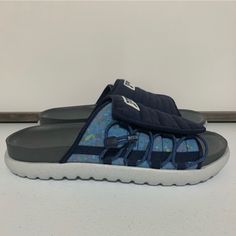 Nike Men's Asuna 2 Next Natura Slides -Size 12 (13 Women’s) -Midnight Navy/Mystic Navy/Grey Fog -Lightweight And Comfortable -2-Part Upper Features Plush Strap -Easily Adjustable Cinch Closure For A Customized Fit -Foam Midsole/Outsole -Rugged Tread Pattern On Outsole Adds Traction On A Variety Of Surfaces -New With Tags -New Without Box Breathable Casual Sport Sandals For Light Sports, Blue Sport Sandals With Rubber Sole, Blue Synthetic Sport Sandals With Rubber Sole, Casual Synthetic Sport Sandals For Light Sports, Sporty Gray Sport Sandals With Cushioned Footbed, Casual Sport Sandals For Light Sports, Sporty Gray Sandals With Cushioned Footbed, Blue Slide Sport Sandals, Nike Casual Sport Sandals With Textured Footbed