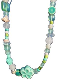 Beachy Turquoise Necklace With Colorful Beads, Ocean-inspired Adjustable Beaded Necklaces With Colorful Beads, Adjustable Ocean-inspired Colorful Beaded Necklace, Green Strand Necklaces For Beach, Green Ocean-inspired Necklaces For The Beach, Green Strand Necklace For Beach, Green Ocean-inspired Necklaces For Beach, Ocean-inspired Green Necklaces For Beach, Green Ocean-inspired Beach Necklaces