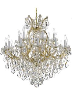 a gold chandelier with crystal drops hanging from it's center and sides