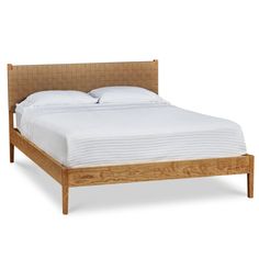 Shaker style bed in cherry wood with woven Shaker tape headboard Handcrafted Bed, Bed With Posts, Oak And Walnut, Sheepskin Throw, Fabric Headboard, Wood Sample, Bed Back, Solid Wood Bed, Black Table