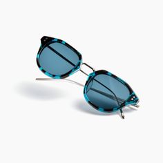 TEAL TORTOISE ACETATE / TEAL LENS / SILVER HARDWARE DESCRIPTION Theory blends art-fashion aesthetics with industrial influences. This design features flat, flush-mounted lenses encased in a metal-acetate frame for a look that’s stylish and a build that's sturdy. Every pair is handmade in limited numbers to ensure top quality and craftsmanship. We plant a tree for each pair of glasses sold on our website in partnership with Eden Reforestation Projects. FEATURES Stainless steel and acetate combina Modern Sunglasses With Mirrored Round Frame, Modern Anti-reflective Round Frame Sunglasses, Modern Sunglasses With Metal Round Frame, Modern Metal Frame Round Sunglasses, Modern Round Frame Metal Sunglasses, Modern Round Metal Frame Sunglasses, Modern Acetate Round Frame Sunglasses, Modern Acetate Sunglasses With Anti-reflective Coating, Modern Acetate Sunglasses With Anti-reflective Lenses