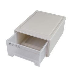 a white plastic drawer with two drawers on the bottom and one drawer open to show its contents