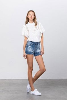 Button-Down Mid-Rise Denim Shorts Upgrade your summer wardrobe with our button-down mid-rise denim shorts. The classic denim look with a modern twist offers both style and comfort. Style: Casual Print/Pattern: Medium wash Denim Silhouette: Shorts Fit: Mid Rise - Regular Embellishment: Distressed edged Neck Line: N/A Sleeve: N/A Length: No Closure: Button Closure Lining: No Made In: CHINA Fabric Contents: 98% COTTON, 2% SPANDEX Stretch fabric Non-sheer fabric Care Instructions: Machine Wash Cold Summer Jean Shorts With Buttons, Jean Shorts With Buttons For Summer, High-waisted Button Jean Shorts For Summer, Mid-rise Button Jean Shorts For Spring, Mid-rise Button Closure Jean Shorts For Summer, Spring Jean Shorts With Buttons, Summer Cutoff Shorts With Button Closure, Denim Shorts With Button Closure For Summer, Chic High Rise Shorts With Button Closure