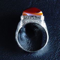 Enhance your style with this unique handmade men's ring. Made from solid 925 sterling silver and featuring a stunning multi-color banded agate stone, this ring is a must-have for any men's outfit. Handcrafted by Turkish jewelers in completely silver, it's an elegant and eye-catching piece at the same time. Comes in ring size 12 with free resizing and worldwide delivery option. Classic Agate Rings For Formal Occasions, Agate Gemstone Signet Ring For Anniversary, Classic Agate Rings For Anniversary, Anniversary Agate Signet Ring With Polished Finish, Classic Agate Signet Ring For Formal Occasions, Eye Agate, Silver Eye, Color Bands, Banded Agate