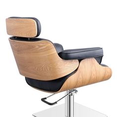 the modern chair is made from wood and black leather