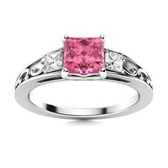 a pink and white diamond ring on a white background