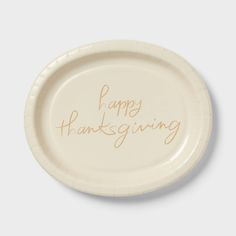 a paper plate with the words happy thanksgiving written on it