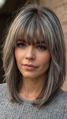 Stylish medium length gray hairstyles with bangs fo Hairstyles With Bangs Medium, Gray Hairstyles With Bangs, Bangs Medium Length, Medium Length Hairdos, Grey Blending, Gray Hairstyles, Layers Medium, Grey Hair Transformation, Hair Highlights And Lowlights