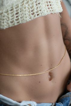 WHEN YOU WANNA CHANGE IT UP WHAT IT IS: A dainty, convertible belly chain with a round disc charm in gold vermeil WHY IT’S SPECIAL: Make a statement with some dainty, but daring body jewelry. Wear it is a wrap necklace, a long necklace or a belly chain! GOOD TO KNOW: Gold vermeil: 18k gold plating over sterling silverDimensions:Extra Small: 26 inches with 3 inches extender chain for a total of 29 inches.Small: 28 inches with 3 inches extender chain for a total of 31 inches.Medium: 30 inches with Cheap Waist Chain Gift, Cheap Elegant Waist Chain For Festivals, Belly Necklace Chains, Adjustable Waist Chain As A Gift, Dainty Adjustable Waist Chain For Gift, Dainty Adjustable Waist Chain As Gift, Delicate Gold Jewelry With Curb Chain, Minimalist Body Chain As A Gift, Minimalist Gold Body Chain