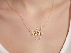 "Introducing our Dainty Script Name Necklace, a delicate and personalized accessory that embodies elegance. This necklace features your chosen name beautifully crafted in a graceful script font. The dainty design adds a touch of sophistication, making it perfect for everyday wear or special occasions. Made with high-quality materials, it offers both durability and timeless beauty. This Dainty Script Name Necklace is a thoughtful and unique gift that celebrates individuality and holds a special p Elegant Name Charm Necklaces For Personalized Gift, Elegant Customized Charm Necklace For Mother's Day, Elegant Rose Gold Necklaces With Names, Elegant Name Necklace For Gifts, Elegant Rose Gold Necklace With Names, Elegant Customized Charm Necklaces For Valentine's Day, Elegant Customized Necklaces For Gift-giving, Elegant Necklaces With Names For Gifts, Elegant Name Necklaces For Mother's Day