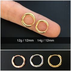 three different types of gold hoop earrings on a black background, one is size and the other is width