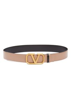 An antiqued VLOGO buckle based on a 1979 archival motif brands this reversible leather belt featuring two keepers to match or contrast with each side. 1 1/2" belt width; 2" x 3 1/2" buckle Leather Made in Italy Reversible Belt, Belt Size, Belts For Women, Valentino Garavani, Leather Belt, Calf Skin, 1970s, In Italy, Nordstrom