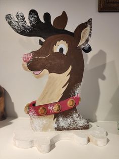 This unique reindeer will make a great addition to your shelf, holiday decor, or give as a gift! Reindeer is cut out of 3/4 inch pine, hand painted with acrylic paint and then clear coated.  Reindeer is approx 14 inches tall. Ready to ship right away! Bring your adorable reindeer home today! Gnome Christmas, Painted Wood, Painting On Wood, Acrylic Paint, Reindeer, Ornament Decor, 4th Of July, 4 Inch, Seasonal Decor