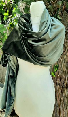 "Olive Green Velvet Shawl This shimmering lush shawl is chic elegant and cozy. Featuring rich velvet, it is the perfect accessory to upgrade your look. Made from a super soft lush velvet jersey knit fabric for a comfortable wear. Double sided, velvet on both sides! Stitched around the perimeter to prevent twisting and slipping! Gentle machine wash, lay flat to dry. ** 3 sizes available ** Measurements: Length: 80\" Width: 27\" Length: 70\" Width: 25\" Length: 60\" Width: 23\" There may be slight Elegant Dupatta Scarf, Elegant Dupatta Scarf For Wedding, Elegant Wedding Dupatta Scarf, Evening Shawl Wrap Scarf, Elegant Shawl With Traditional Drape, Evening Shawl Wrap, Wedding Pashmina Shawl Traditional Drape, Formal Shawl Wrap Scarf, Wedding Scarf Wrap Shawl