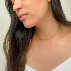 Kris Choker Necklace is the perfect dainty layering necklace! The gorgeous chain is stainless steel with gold plating, and it will not tarnish with minimal care. Layer it with all your favorite necklaces, or wear it alone for a chic, minimal look. 18K Gold Plating on Stainless Steel. Waterproof. About 13.5 in + 2 in. extension Minimalist Rose Gold Layered Necklace With Delicate Chain, Minimalist Rose Gold Layered Necklace With Adjustable Chain, Dainty Rose Gold Chain Necklace For Layering, Dainty Everyday Chain Necklace, Minimalist Yellow Gold Choker With Adjustable Chain, Gold Plated Delicate Chain Necklace, Dainty Yellow Gold Choker For Everyday Wear, Simple 14k Gold Filled Charm Necklace With Delicate Chain, Delicate Gold-plated Chain Necklace