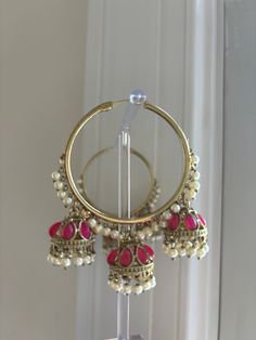 These elegant Jhumka hoop Earring are made for you 😍 Luxury Tilla Jhumkas For Eid, Luxury Jhumkas For Diwali Rituals, Bohemian Cheap Jhumkas For Diwali, Festive Bollywood Metal Hoop Earrings, Chandbali Metal Hoop Earrings For Celebration, Festival Chandbali Hoop Earrings, Bollywood Style Metal Hoop Earrings For Festivals, Wedding Chandbali Hoop Earrings, Pink Hoop Earrings For Wedding