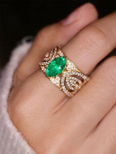 *Condition: Brand new *Center Stone: Natura emerald from Zambia, Oval Cut approx 2ct *Side Stone: Natural white diamond, round cut, approx 19.5ct (VS1 clarity and F color) *Gold Weight: 11.34g *Metal Purity: Can be select Each piece is made-to-order with care and special attention to detail. all items are made with conflict-free diamonds and gems. Size: made to order The item will be gift wrapped and shipped. --------------------------------------------------------- Available in : 14k Rose or Ye Luxury Marquise Emerald Ring For Wedding, Luxury Marquise Emerald Wedding Ring, Luxury Emerald Wedding Ring For May Birthstone, Yellow Gold Tsavorite Diamond Wedding Ring, Luxury Tsavorite Wedding Rings, Luxury Tsavorite Diamond Wedding Ring, Luxury Emerald Ring With Accent Stones For Wedding, Gia Certified Emerald Wedding Ring, Emerald Gem