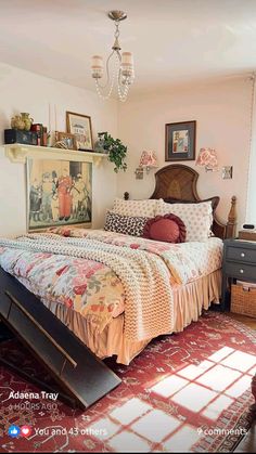 a bed sitting in a bedroom on top of a red floor next to a window