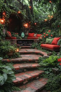 an outdoor living area with red couches and green plants on the stairs, surrounded by greenery