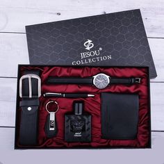 an assortment of men's accessories in a gift box