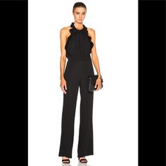 Details Tiered Ruffles Trim The Scoop Neckline And Frame The Open Back On This Wide-Leg Diane Von Furstenberg Jumpsuit. Hidden Back Zip. Lined. Fabric: Crepe. Shell: 100% Silk. Lining: 100% Polyester. Dry Clean. Imported, China. Measurements Inseam: 34.25in / 87cm Leg Opening: 21.25in / 54cm Measurements From Size 4 Style #Diavf44170 Sleeveless Ruffled Jumpsuits For Formal Occasions, Formal Sleeveless Ruffled Jumpsuits And Rompers, Formal Sleeveless Ruffled Jumpsuit, Elegant Spring Jumpsuits And Rompers With Ruffles, Elegant Ruffled Jumpsuits And Rompers For Date Night, Elegant Ruffled Jumpsuits And Rompers For Party, Elegant Jumpsuits And Rompers With Ruffles For Party, Elegant Workwear Jumpsuits And Rompers With Ruffles, Sleeveless Elegant Jumpsuits For Black-tie Events