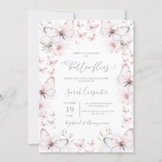 a wedding card with pink flowers and butterflies on the front, in watercolng