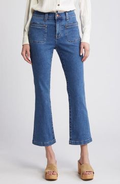 An evolution of the brand's fan-fave fit, these mid-rise cropped jeans have angled front welt pockets and kicked-out flares with leg-elongating center seams. 26 1/2" inseam; 18" leg opening; 10 1/2" front rise; 15" back rise (size 29) Zip fly with button closure Front welt pockets; back patch pockets 98% cotton, 2% elastane Machine wash, tumble dry Imported Crop Jeans, Back Patch, Welt Pockets, Cropped Jeans, Welt Pocket, Patch Pocket, Madewell, Evolution, Mid Rise