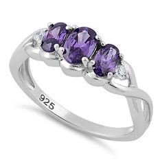 Top of ring height: 8mm

Top of ring width: 11mm

Band width: 4mm

Shank width: 1.8mm



Stone material: purple & clear cubic zirconia

Center stone size: 6mm x 4mm

Stone shape: oval (center) & round

Center stone carat weight: 0.4 ct.

Total number of CZ stones: 5

Stone setting: Prong setting



Metal: 925 sterling silver

Plating: rhodium plated

Finish: high polish Handmade Jewelry Ring, Costume Jewelry Rings, 3 Stone Rings, Jelly Roll, Cz Ring, Cz Stone, Semi Precious Gemstones, 925 Sterling Silver Ring, Stone Rings