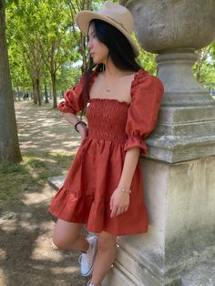 Sweet and effortless, this stunning linen dress is a true go-to mini. This dress is perfect for a day out in the city with your friends or for sipping cocktails at a picnic.  The upper part is elastic and super confortable, fitting all body types like a glove and accentuating the waist. The colour is a warm brick orange in a 100% linen fabric. Handmade to order in Paris in our small atelier.  Free shipping worldwide! Yay! And we accept returns :) If you have any questions or if you want to buy i Short Dress With Sleeves, Small Atelier, Dress With Puff Sleeves, Burnt Orange Dress, Linen Short, Festival Dress, Bohemian Dress, Orange Dress, Festival Wear