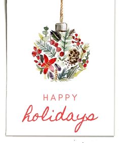 a holiday card with an ornament hanging from a rope and the words happy holidays