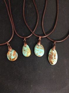 "Kingman Turquoise Nugget Pendant in colors of green and blue with brown matrix. Brown cord is 16\" long with 2.5\" ext. chain, copper bail. Colors and sizes vary due to mother nature. Average size of pendant is .75\" long .50\" wide. Made exclusively by the Kingman Turquoise Mine." Artisan Adjustable Turquoise Necklace Nickel Free, Brown Southwestern Jewelry With Patina, Southwestern Brown Jewelry With Patina, Handmade Adjustable Brown Turquoise Necklace, Handmade Southwestern Adjustable Turquoise Necklace, Handmade Adjustable Southwestern Turquoise Necklace, Southwestern Style Adjustable Teardrop Necklace, Brown Southwestern Teardrop Jewelry, Southwestern Brown Teardrop Jewelry