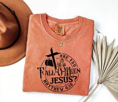 Celebrate the fall season and your faith with this Comfort Colors® Christian Halloween Shirt. Perfect for anyone who loves both Jesus and autumn, this shirt features a humorous "Are You Fall-O-Ween Jesus?" design with a cute pumpkin theme. Whether you're attending a fall church event, celebrating Falloween, or just want to show off your love for Jesus, this shirt is a perfect choice. It's also a great gift for those who don't celebrate Halloween but still want to enjoy the season. Made from high-quality materials, this shirt is comfortable and stylish for any occasion. Embrace the spirit of the season while spreading a positive message of faith! Comfort Colors t-shirt, a fully customizable tee made 100% with ring-spun cotton. The soft-washed, garment-dyed fabric brings extra coziness to yo Jesus Halloween Shirt, Jesus Pumpkin, Harvest Bible, Autumn Shirts, Christian Halloween, Retro Pumpkin, Jesus Design, Fall O, Copper Coin