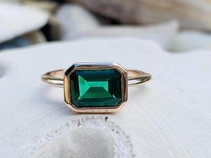 14k Gold Emerald Ring East West Setting Emerald Engagement | Etsy Emerald Ring With Bezel Setting For May Birthstone, Anniversary Emerald Ring With Bezel Setting, Bezel Set Baguette Cut Emerald Ring, Emerald Baguette Cut Ring With Bezel Setting, Formal Emerald Ring With Rectangular Stone And Bezel Setting, Green Emerald Cut Ring With Bezel Setting, Baguette Cut Emerald Ring With Bezel Setting, Baguette Cut Bezel Set Emerald Ring, Rectangular Emerald Ring With Bezel Setting As Gift