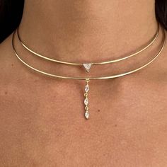 Three sparkling stones center this sleek choker made from shiny vermeil, adding to its ethereal vibe. Pair it with a simple pair of studs for a timeless look. - Gold vermeil; rhodium plated- White sapphire - Approximately 7.29 grams- 14" circumference / 4.75" width- Hook and loop closure Formal 14k Gold Choker Jewelry, Elegant Cubic Zirconia Clavicle Chain Choker, Elegant Diamond Choker Necklace For Anniversary, Elegant Diamond Choker For Anniversary, Anniversary Diamond Accent Choker Necklace, Elegant Anniversary Diamond Choker Necklace, Fine Jewelry Diamond Choker Necklace For Gift, Classic Diamond Choker Jewelry, Elegant Gold Cubic Zirconia Choker