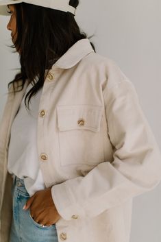 Toss on to complete any look - this structured shacket is cut with an oversized fit that's ideal for fall layering and finished in thick cream corduroy that pairs perfectly with all your basics. The unlined interior makes it light enough to style as an overshirt or to layer up for multipurpose wear. Tortoise shell buttons, two front flap pockets and PN's signature logo tag detail finish the piece with a utility feel. Fit: True to size, with an oversized cut 98% Cotton, 2% Spandex. Machine wash c Fall Layering, Wrap Carrier, Baby Bjorn, Fall Layers, Birthday Tee, Doll Play, Changing Pad Cover, Logo Tag, Shell Buttons