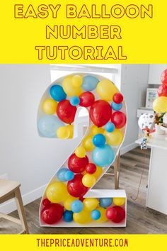 the number 2 made out of balloons with text overlay