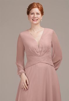 The AW Fernanda Dress is an elegant tea-length dress with an A-line silhouette that flatters all figures. It boasts a tasteful V-neckline and long sleeves for an air of sophistication. Ruching at the waist cinches and sculpts a flattering silhouette, while a built-in bra and discreet zipper ensure a seamless fit. Elegant Long Sleeve V-neck Wedding Dress, Long Sleeve Maxi Dress With Ruched Bodice, Fall V-neck Dress With Fitted Bodice, Long Sleeve Midi Dress With Ruched Fitted Bodice, Fitted Long Sleeve Midi Dress With Ruched Bodice, Elegant Long Sleeve Dress With Surplice Neckline For Spring, Feminine Long Sleeve Midi Dress With Fitted Bodice, Elegant Long Sleeve Dress With Surplice Neckline, Elegant Fall V-neck Dress With Surplice Neckline