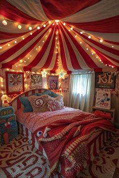 a bedroom decorated in red and white with lights on the ceiling, bedding and rugs