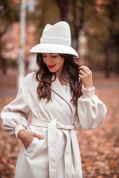 Ivory Millinery Couture Asymmetrical Crown Wide Brim Women  Felt Fedora Hat, Elegant Ledies Velour hat READY to SHIP The hat has long ceased to be just an accessory. Today it plays an essential role in the life of a modern woman. It gives a mood, inspires, complements the image, distinguishes from the crowd, offers exceptional chic elegance and shows the high taste of its owner. The hat is a feminine soul that is so changeable. Today it demonstrates her sole to the whole world, and tomorrow it hides from everyone behind broad brims. Your mood can be emphasized by the geometry and shape of my hats. The combination of brim and crown of the hat is ready to tell a lot about you. Remember this always. And if you don't know which hat is right for you, DM me and get a free consultation on selecti Elegant Curved Brim Fedora For Fall, Elegant Fedora With Curved Brim For Fall, Elegant Fall Fedora With Curved Brim, Beige Cloche Hat With Curved Brim For Fall, Beige Wide Brim Fedora For Winter, Cream Fedora With Flat Brim For Fall, Elegant Brimmed Felt Hat For Fall, Fitted Cream Fedora Felt Hat, Elegant Fedora Hat For Fall