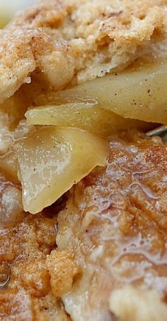 a close up view of some food on a plate with a fork and spoon in it