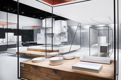 the interior of a modern kitchen with wooden counter tops