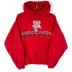 Vintage Wisconsin Badgers Sweatshirt Hoodie Extra Large Red Ncaa Size/Measurements (Based in inches) Size - XL Pit to pit - 28" Length - 26" Shoulder to cuff - 21.2" Condition / Details Vinyl cracking Stains on the right sleeve Pinhole on the back Seam separation on the front by the hood Combined Shipping: We provide combined shipping, please contact us for a quote Red Fan Apparel Hoodie, Red Hoodie With Letter Print For College, College Red Hoodie With Letter Print, Collegiate Red Hoodie Top, Red College Hoodie With Letter Print, Red Fan Apparel Hoodie With Graphic Print, Red Crew Neck Fan Apparel Hoodie, Red Graphic Print Fan Apparel Hoodie, Red Crew Neck Hoodie Fan Apparel