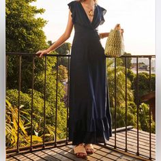 Navy Blue V Neck Dress By Maria Valentina. 46% Viscose 24% Polyester 20% Linen 10% Cotton Lining: 100% Viscose Made In Brazil Navy V-neck Vacation Dress, Elegant Blue Maxi Dress For Summer, Chic Blue Floor-length Dress, Navy Maxi Dress For Spring Evening, Navy Evening Maxi Dress For Summer, Chic Blue V-neck Maxi Dress, Navy V-neck Maxi Dress For Spring, Elegant Blue Midi Dress For Vacation, Chic Navy Dress For Vacation