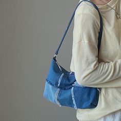 Vintage patchwork denim hand bag is just what need to make a statement in your chosen Y2K era. Not a must but a need. Main Material : Denim Lining Material: Polyester Closure Type: Zipper Size: 25 X 18 cm Closure Type: Zipper Pattern Type: Patchwork Shape: Baguette Vintage Blue Denim Shoulder Bag, Casual Denim Patchwork Bag, Casual Patchwork Tote Shoulder Bag, Trendy Patchwork Shoulder Bag For Everyday Use, Casual Blue Patchwork Bag, Denim Blue Patchwork Shoulder Bag, Everyday Denim Patchwork Shoulder Bag, Denim Patchwork Shoulder Bag In Blue, Patchwork Denim Shoulder Bag In Blue