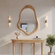 a wooden table and mirror in a room